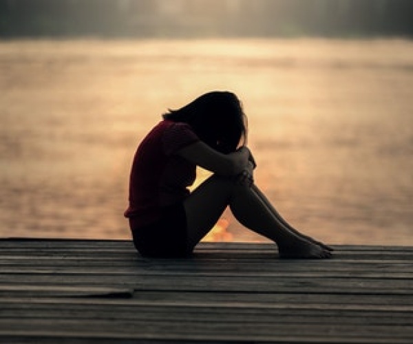 What is the difference between low mood and depression? Image